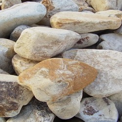 Песчаник желтый с разводом окатанный 100-300 мм.
